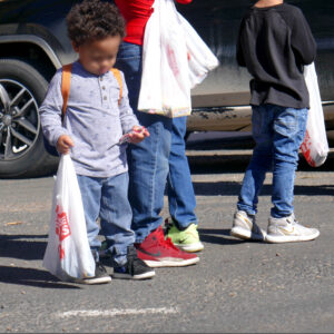 boy with parade candy